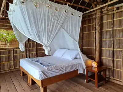 Traditional Papuan-style interior with natural building materials.
