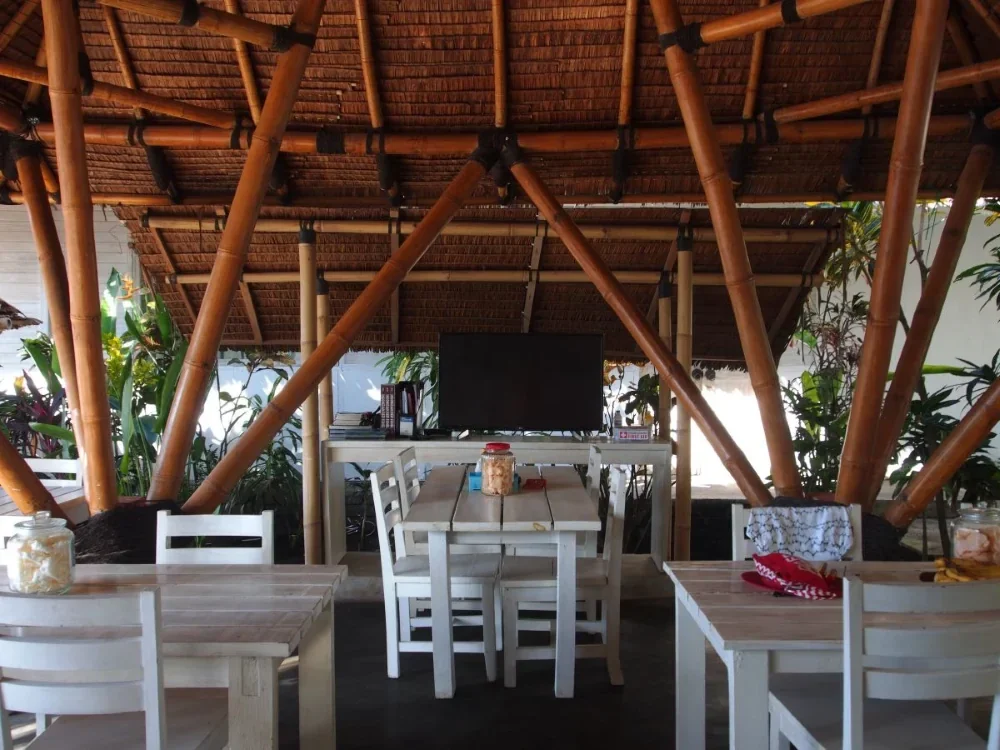 Dining area with hot meals prepared for each individual.