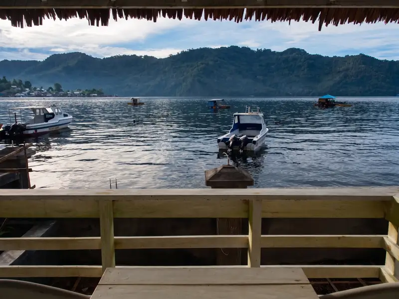 Spectacular sunrise view over Lembeh Island from your private villa deck.