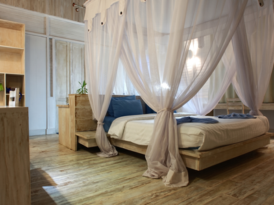Exclusive Beach Villa master bedroom with premium furnishings and ocean views.
