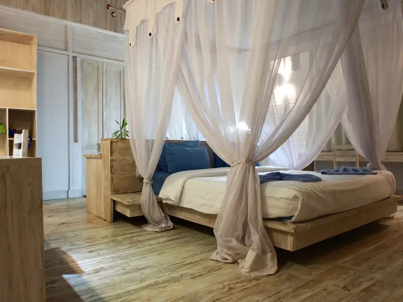 Exclusive Beach Villa master bedroom with premium furnishings and ocean views.