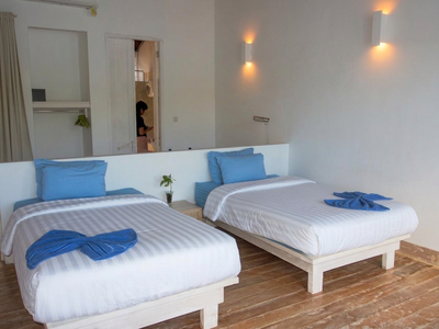 Elegant Sea View Room interior featuring large windows for natural light.