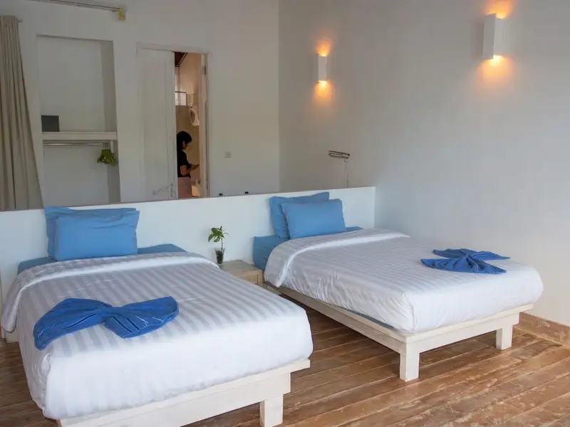 Elegant Sea View Room interior featuring large windows for natural light.